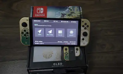 Nintendo switch oled ( trading for handle portable devices)., View more