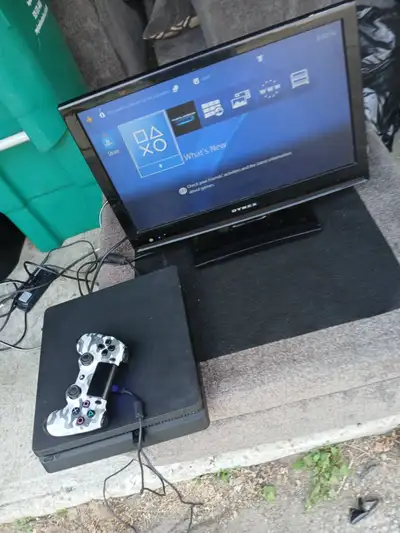 Sony PlayStation 4 Slim with Controller and TV, View more