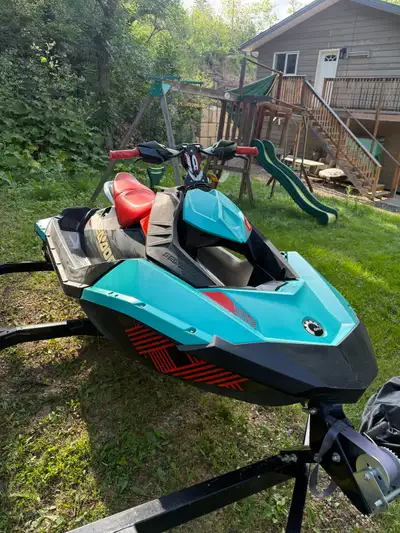 Seadoo Trixx and Seadoo 3up spark both in great shape, storage covers and double axel trailer asking...