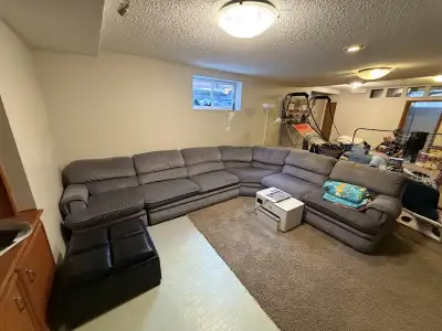 Sectional with pull out hideabed and recliners on both corners. Side is 142” x 110”. Cat friendly ho...