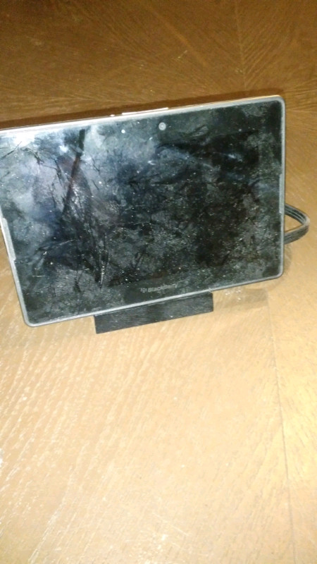 Blackberry tablet and charging stand in General Electronics in Markham / York Region