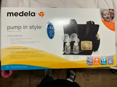 selling our slightly used breast pump, complete with all the accessories included in the box. steril...