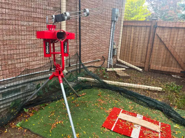 Batting Cage and Pitching Machine
