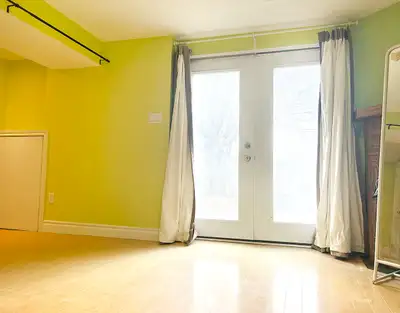 Bright Private Walk-Out Garden Suite with Parking Option • Ground-level garden suite with separate p...