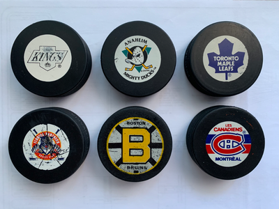 vintage NHL hockey pucks, View more