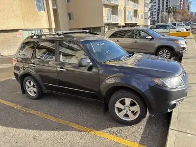 2010 Subaru Forester. Bought a new vehicle so I don’t need this one anymore. Has summer and winter t...
