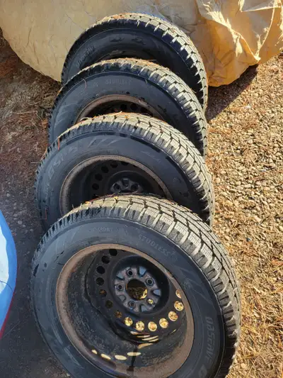 2003 Chevrolet Malibu 5x115 mm bolt pattern rims, Toyo 215/60/15 Observe GSI-5 Winter tires w/90% tr...