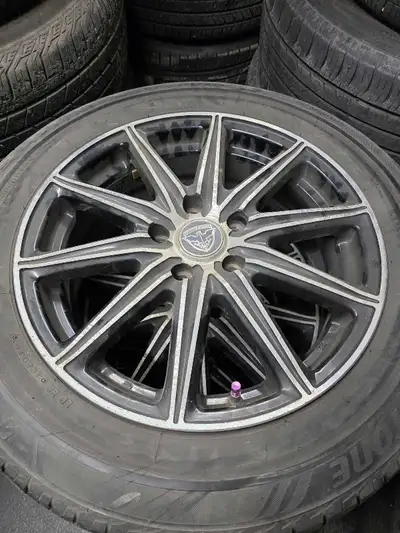 Hello I have a set of alloy rims for sale. They are currently still mounted with tires, which i will...