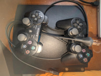 PS3 Slim Console + 2 Controllers