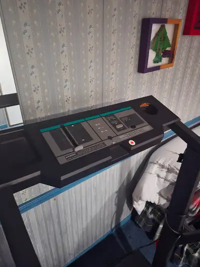 Treadmill black and used but in good condition