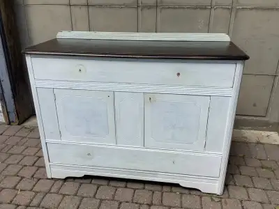 Solid wood sideboard. Dovetailed drawers. Drawers slide well/easily 48" x 18" x 37"