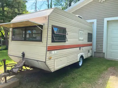 Good condition. Small ac for back window, little fridge and freezer included.