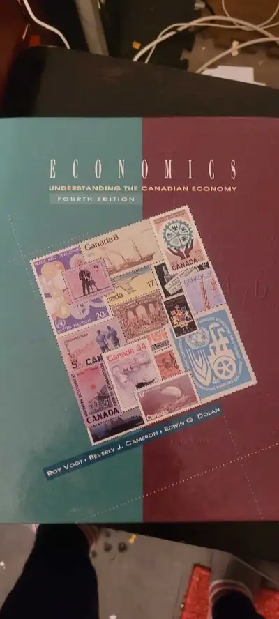 This is the Economics: Understanding the Canadian Economy Fourth Edition textbook. It's a used copy,...