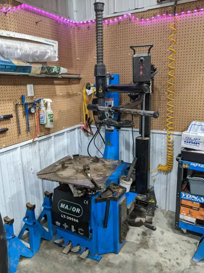 Low-Profile Tire Changing Machine & Computer Balancer See links below for all Model Specifications....