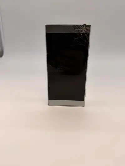 Sony Xperia smartphone in silver. The screen is cracked and the phone is untested, so it is being so...