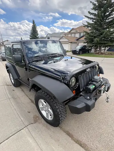 2013 Jeep Wrangler Sport—no nonsense, just adventure. Manual windows, manual transmission, no AC—les...