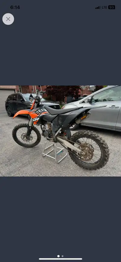 I am selling a used 2010 KTM 150 SX dirt bike, known for its powerful 150cc engine and lightweight d...