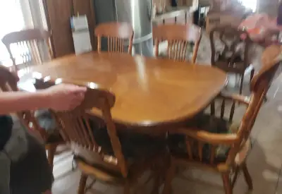 Oak wood pedestal dinning table with 6 matching chairs, View more