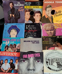 job lot 45 rpm records and some picture sleeves