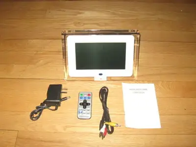 New Digital Photo Frame 7.0-Inch-High Quality LCD Screen Features: Views Photos, Play Movies, Listen...