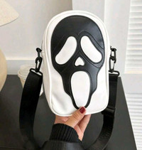 Brand new Scream/Ghostface purses. Have 2 black and 2 white
