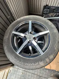 Alloy rims with Cooper all weather tires