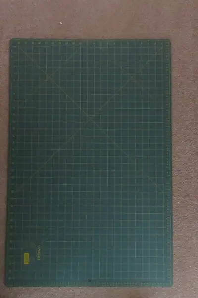 Unique brand green, self-healing, double -sided cutting mat. 35" (89 cm) x 23" (58 cm) grid. Only us...