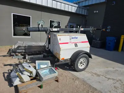 2008 Magnum Light Tower 7KW generator with 120V / 240V sockets. Mitsubishi diesel engine. Only 7971...