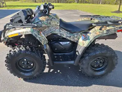 Selling my 08 can am outlander XT with only 1667 kilometers ,never used for mudding , power steering...