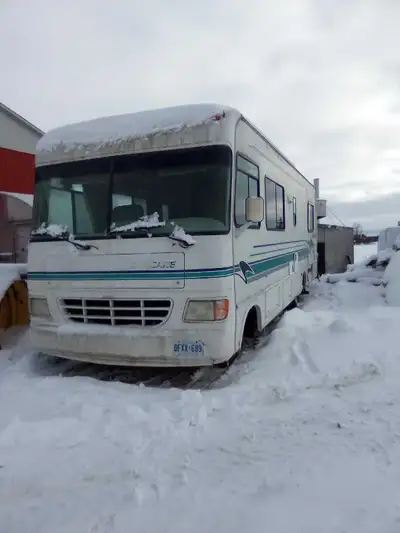 1995 Hurricane RV. Runs and drives great. No leaks. There is a crack in the front bumper. A very coz...