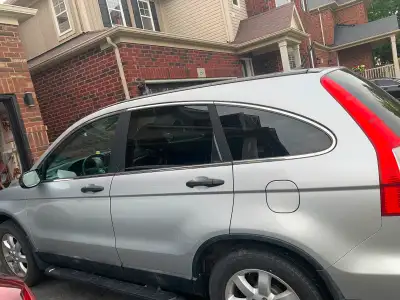2011 Honda CRV 4 Door... 2WD Running Boards and Tinted windows Comes with remote starter and 2 sets...