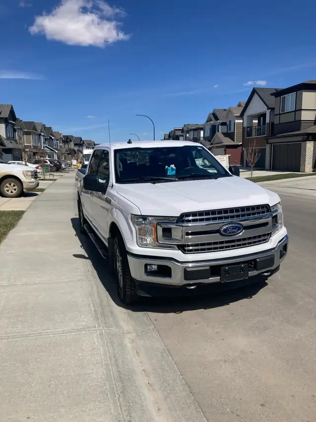 Mover- 5.5’ bed half ton pickup truck with helper
