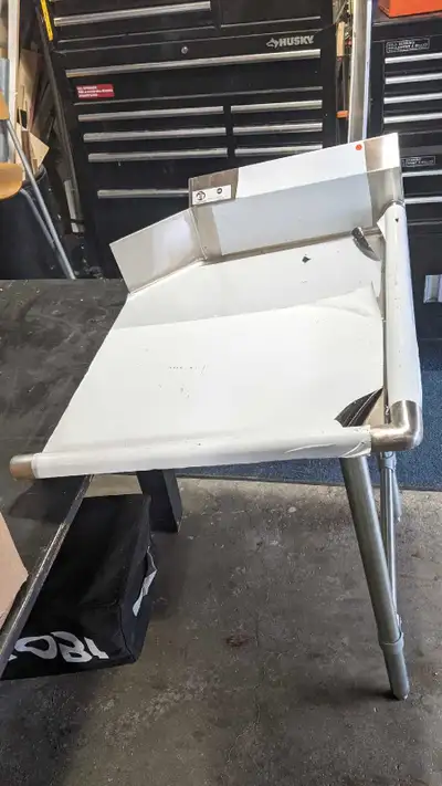 Made for right side of your dish machine, fits in the machine and can attach to the wall or be free...