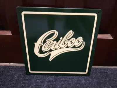 Show everyone how you Boo with a Cariboo tin sign. With 4 mounting points, you can hang this sign ju...