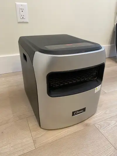 compact infrared Zone Heater with rear intake Hepa Filter. Works well. Used to warm our TV room, but...