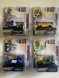Transformers lot of 4 Diecast Collectibles