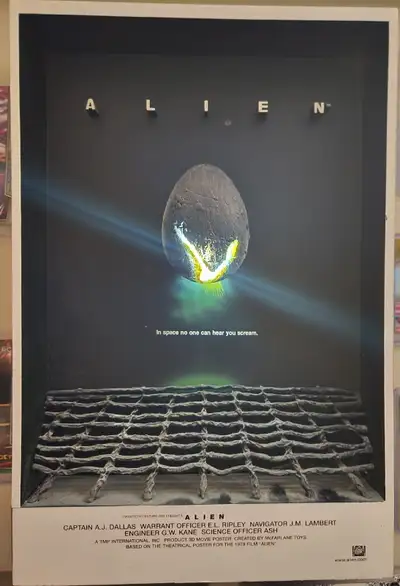 • One of the best space horror movies ever. This 3-D Alien poster includes a light-up feature that i...