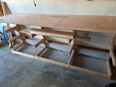 Woodworking bench with storage for off cuts or full 8' length pieces. Not freestanding. I had it mou...