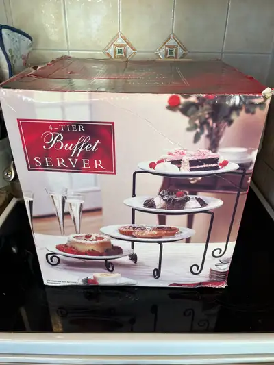 This server is made of a black cast iron base that is wholly attached to itself , only the plates be...