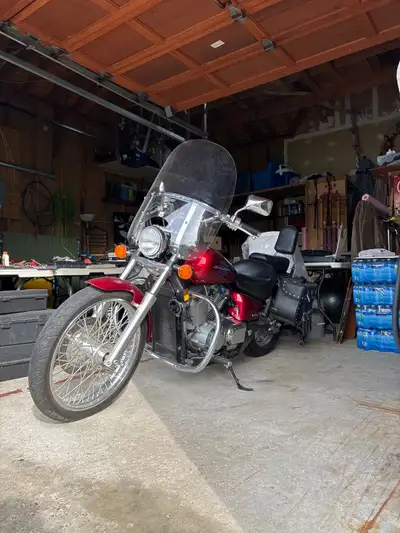 Red 2009 Shadow 750 - 12,000km - One past owner - Great condition, ready to go Call Roy Bradley: (70...