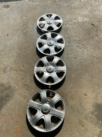 These set of four 15-inch Toyota hubcaps are in good, pre-owned condition and ready to enhance the l...
