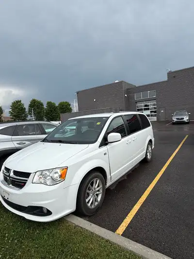 2019 Dodge caravan with free winter tires on rims Trim - 35 th Anniversary Financing available. Text...