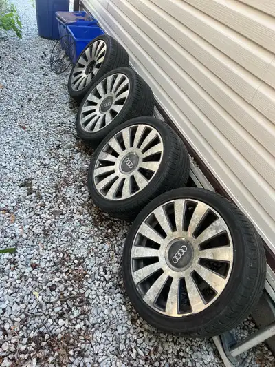A set of audi a8 replica wheels in 18 inch with 235/40r18 tires. 5x100 and 5x112 bolt pattern. tires...