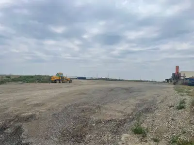 9.93 Acres of Industrial land in corner of intersection , SE Calgary , I.G zoned, fenced 80% develop...