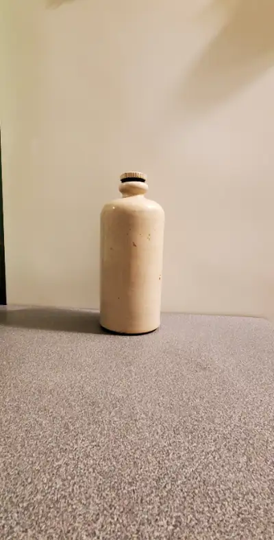 This Antique Stoneware Hot Water Bottle is a great addition to any decor. It has a great vintage sty...