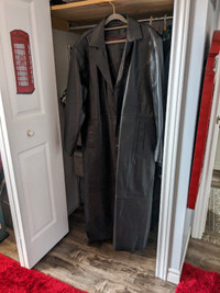 Leather trench coat  fits large for size. Never worn.