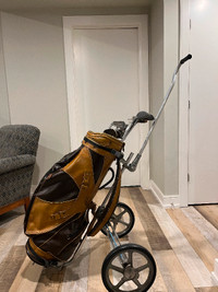 Golf bag, cart and clubs