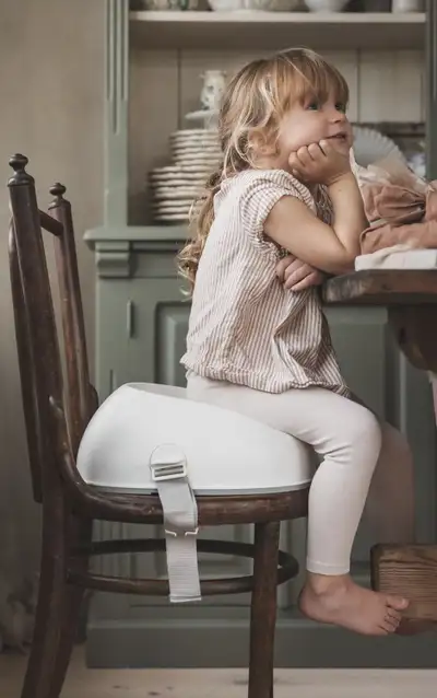 Like new Babybjorn Booster seat. Boosts your child up to just the right height when they want to sit...