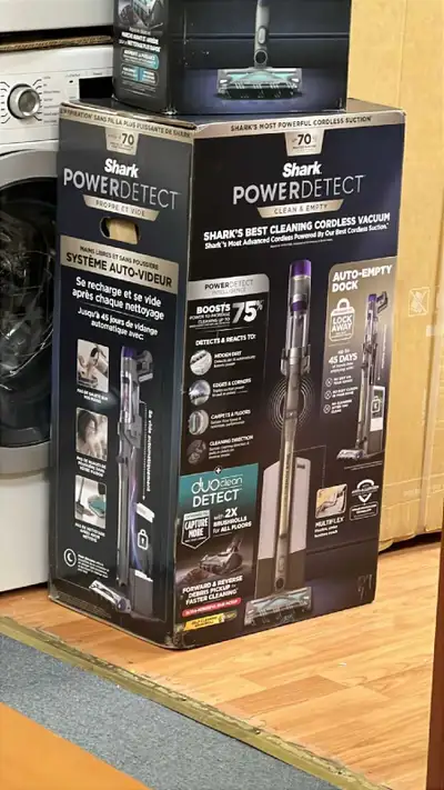 Shark PowerDetect Clean & Empty Cordless Stick Vacuum in like-new condition, offering powerful clean...