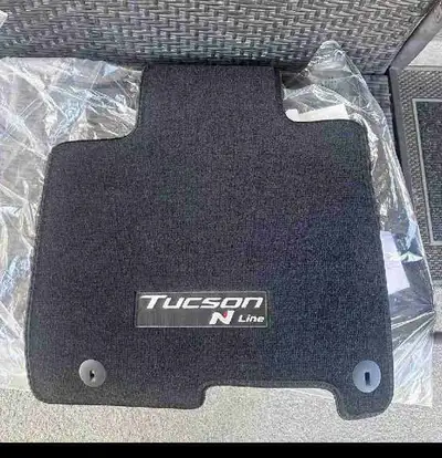 Enhance the interior of your (2025) Hyundai Tucson N Line with these brand-new, black carpet floor m...